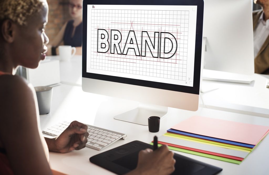 Graphic designer creating a brand logo