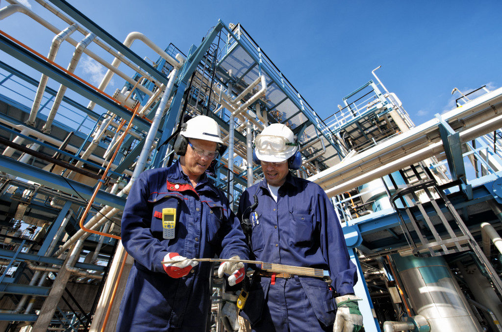 Two engineers in oil production company