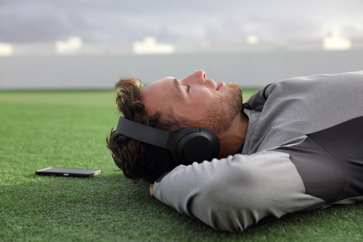 man listening on his headphones