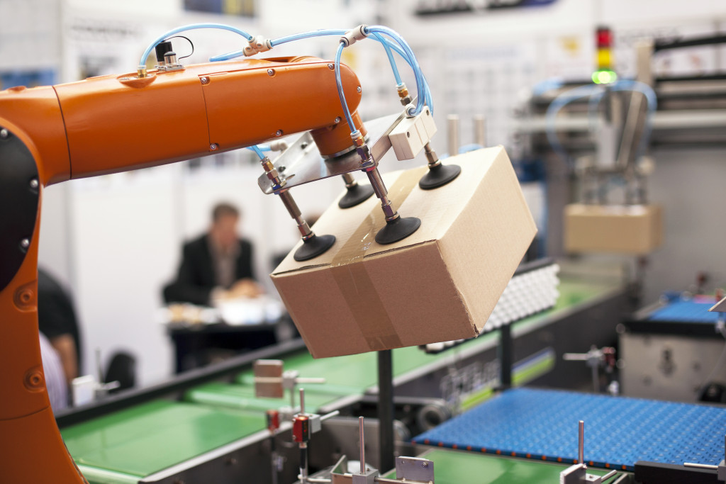 robot arm handling a package